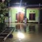 Kondisi ratusan rumah warga di Kampung Kajaroan, Cinangka, Kabupaten Serang, yang masih terendam banjir hingga ketinggian dua meter.