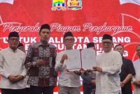 Ribuan warga menghadiri Kirab Budaya Lintas Iman di Royal Baroe, Kota Serang, Minggu, 15 Februari 2026, yang dirangkaikan dengan penandatanganan MoU antara FKUB Kota Serang dan UIN SMH Banten.