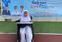 Nayla Alifia, siswi tunadaksa asal SKH YDKW 03 Kota Tangerang, menunjukkan semangat belajar dan berkarya melalui dunia sastra hingga berhasil melaju ke ajang FLS3N tingkat Provinsi Banten 2026
