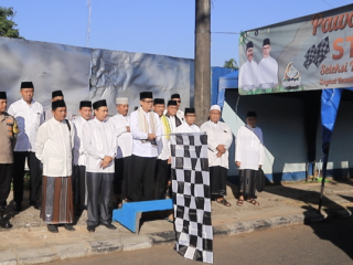 Peserta kafilah dari enam kelurahan di Kecamatan Cibodas mengikuti pawai taaruf pembukaan STQ 2026 dengan penuh semangat dan nuansa religius.