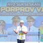 Wali Kota Tangerang Selatan Benyamin Davnie bersama ribuan atlet dan pelatih saat menghadiri kick off Porprov VII Banten 2026 di Lapangan Malibu, Serpong