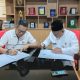 Petugas melakukan persiapan infrastruktur parkir digital di kawasan Stadion Benteng Reborn, Kota Tangerang. Sistem baru berbasis teknologi elektronik ditargetkan mulai beroperasi pada Juli 2026.