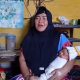 Yuharni bersama bayi Muhammad MBG Subianto di Wonosobo. Nama sang bayi diberikan sebagai bentuk rasa syukur atas manfaat Program Makan Bergizi Gratis yang dirasakan keluarganya.