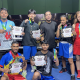Tiga petinju Kota Tangerang berpose usai meraih medali emas pada ajang VIP Boxing Road to PON Beladiri 2026 di PKOR Way Halim, Bandar Lampung.